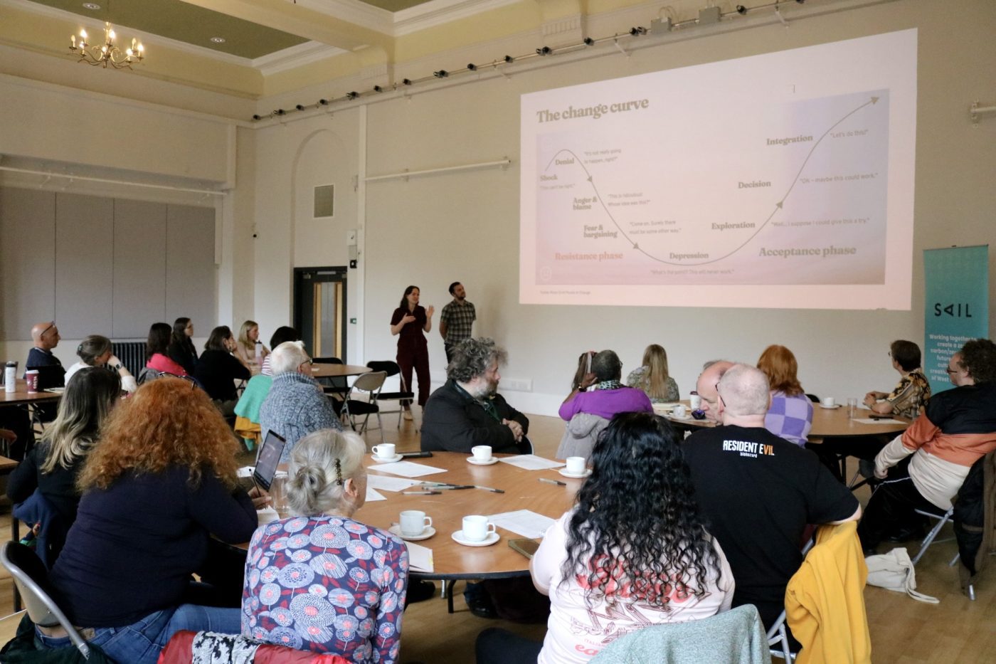 Jamie and Mary presenting at an event